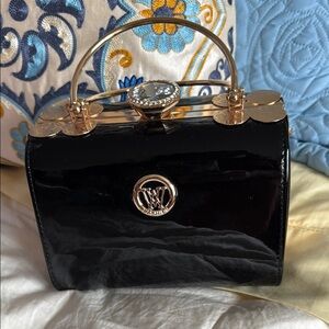 Elegant Black Patent Leather Handbag
